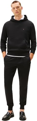 Tommy Hilfiger tracksuit displayed on a mannequin, showcasing its design.